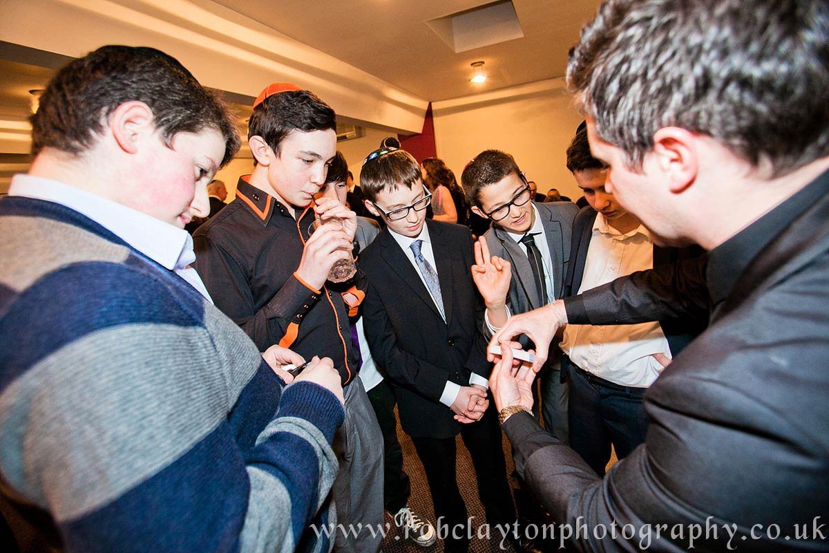 James Anthony performing close-up magic at a Bar Mitzvah